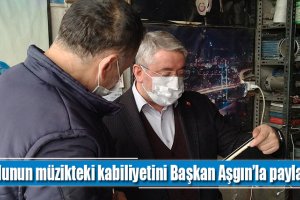 Oğlunun müzikteki kabiliyetini Başkan Aşgın’la paylaştı