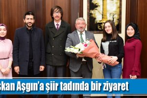 Başkan Aşgın’a şiir tadında bir ziyaret